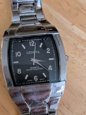 Geneva Silver Tone Watch with Black Dial.
